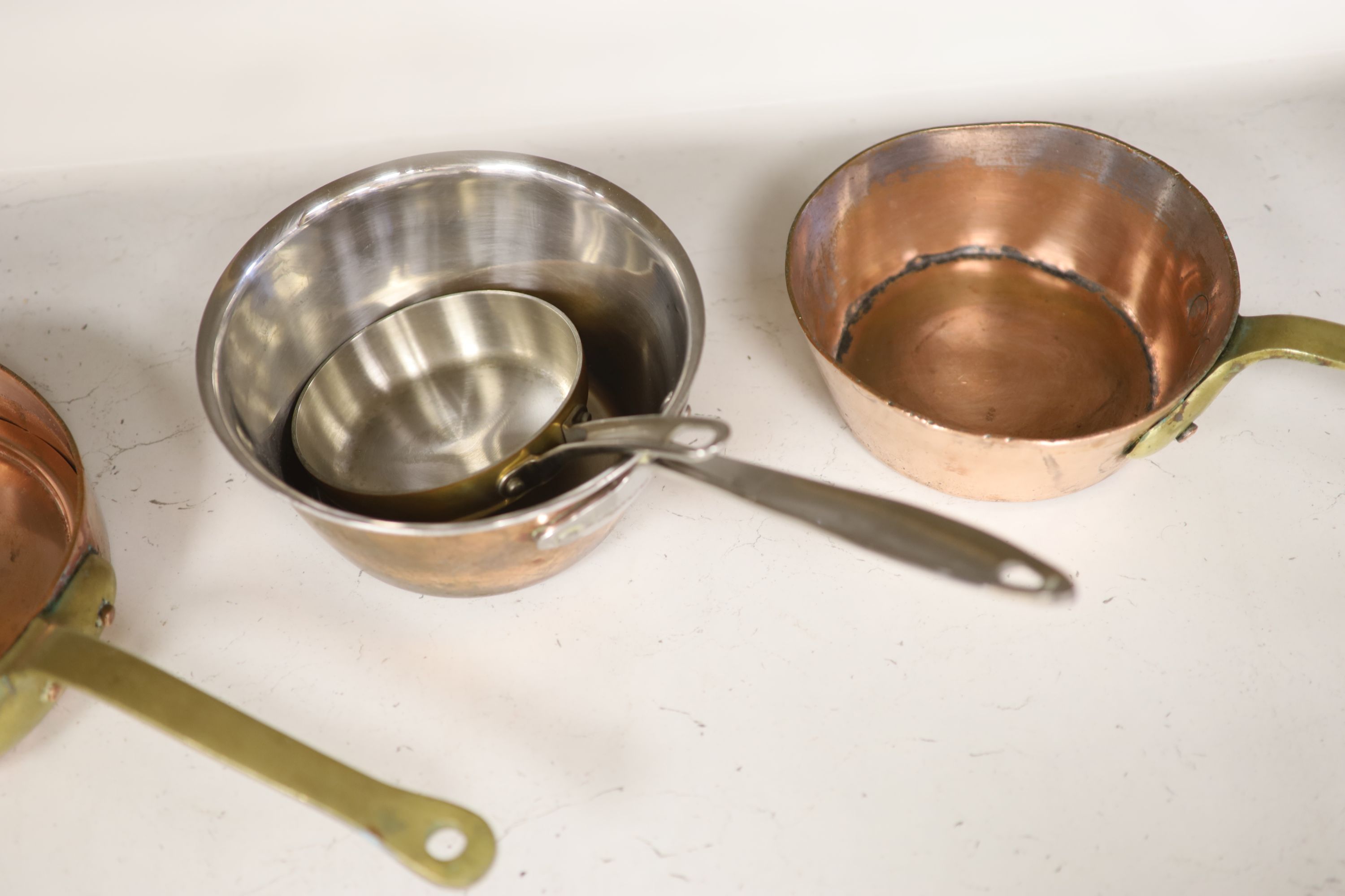 Four French copper pans